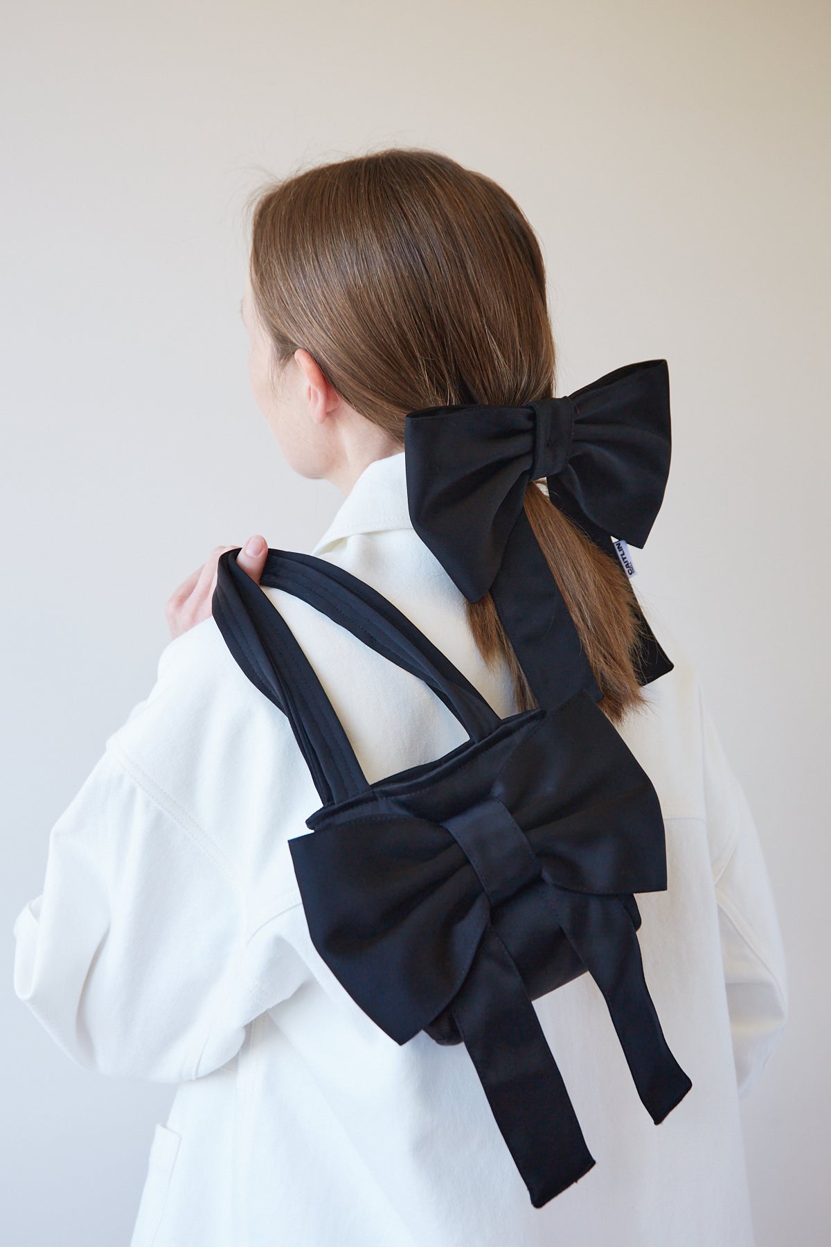 Caitlin Snell + twenty-seven names | Bow Bag