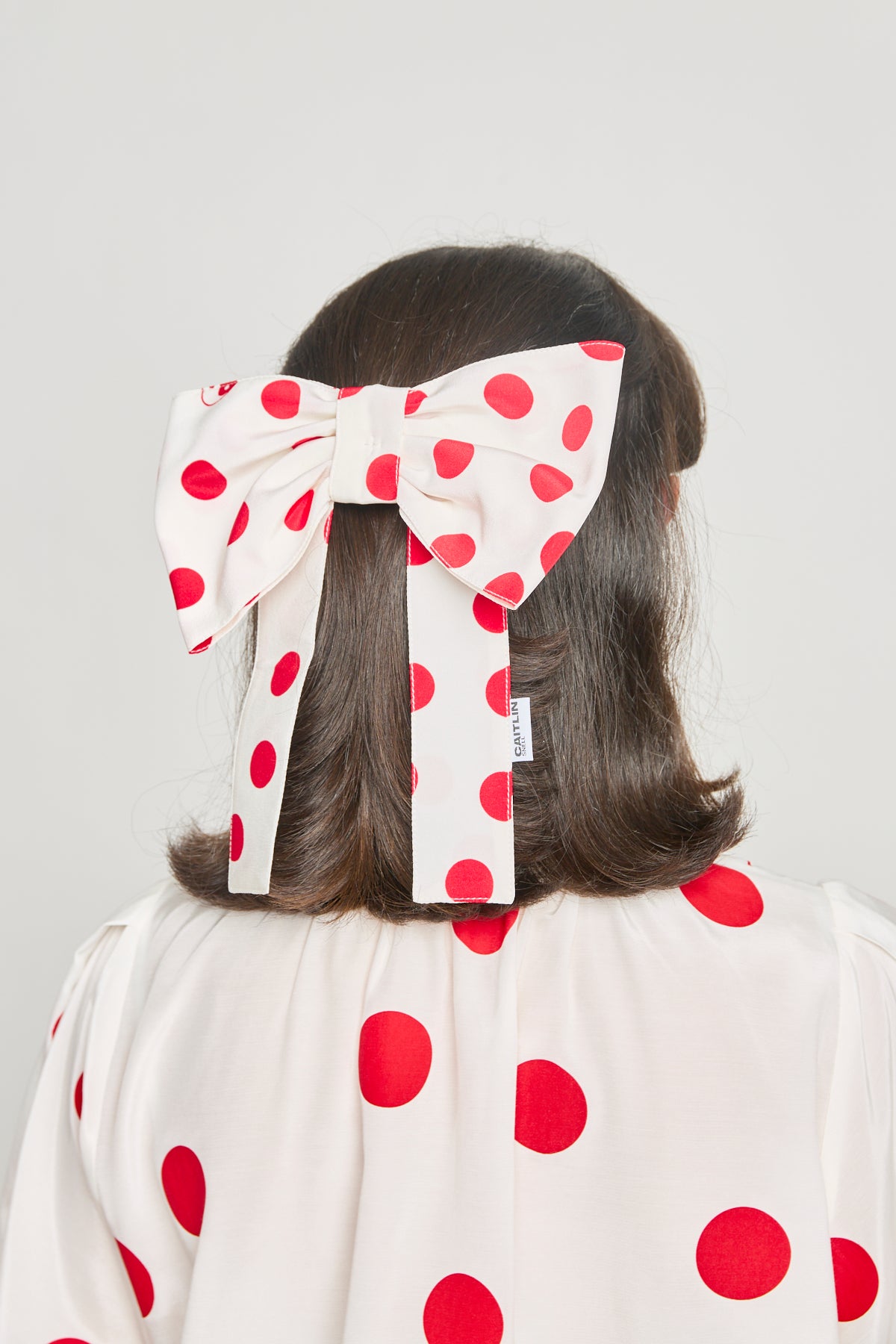 Caitlin Snell + twenty-seven names | Georgie Hair Bow - Red spot