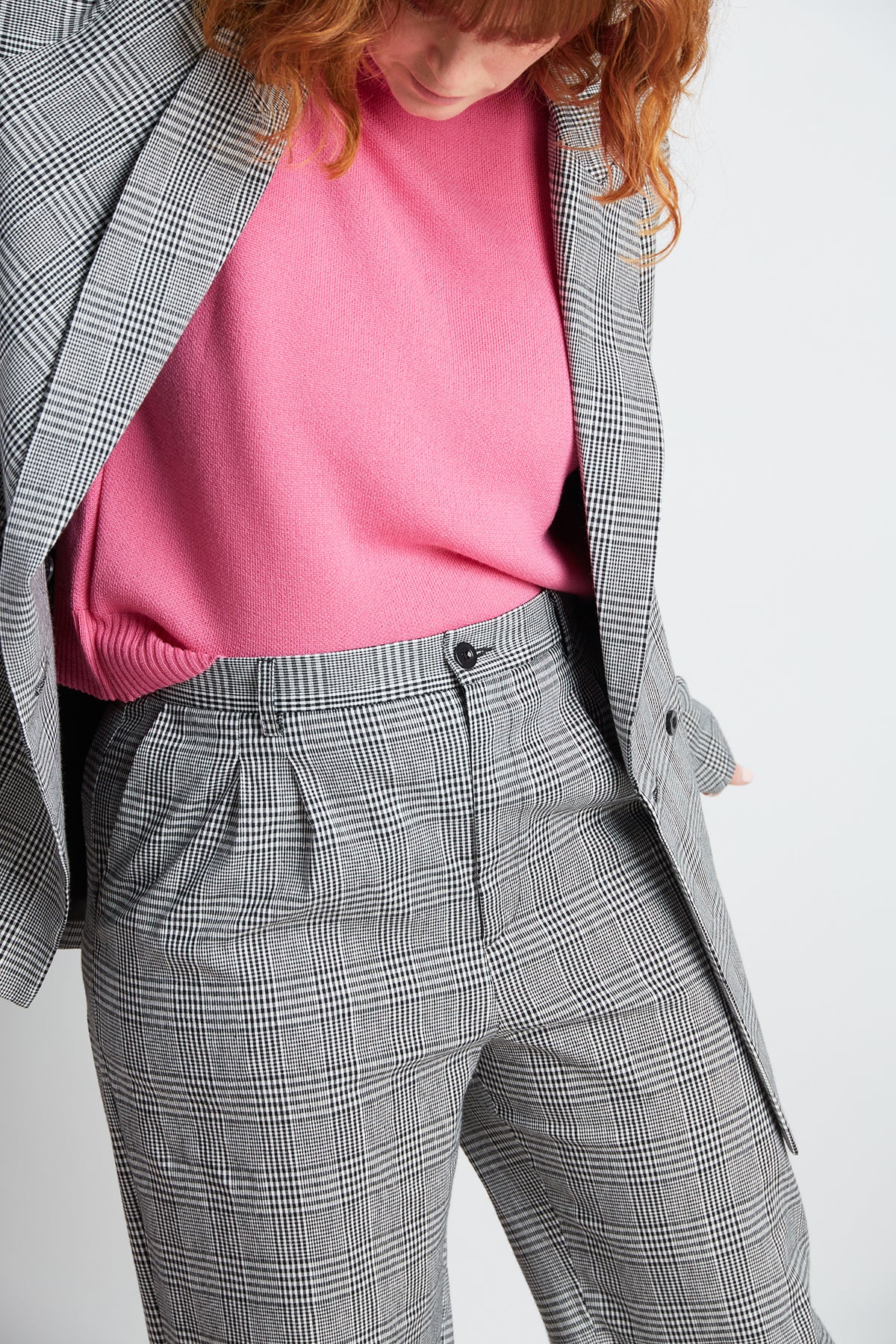 Davenport flares by twenty-seven names. High-waisted plaid pants with a flared leg, pockets and belt loops.