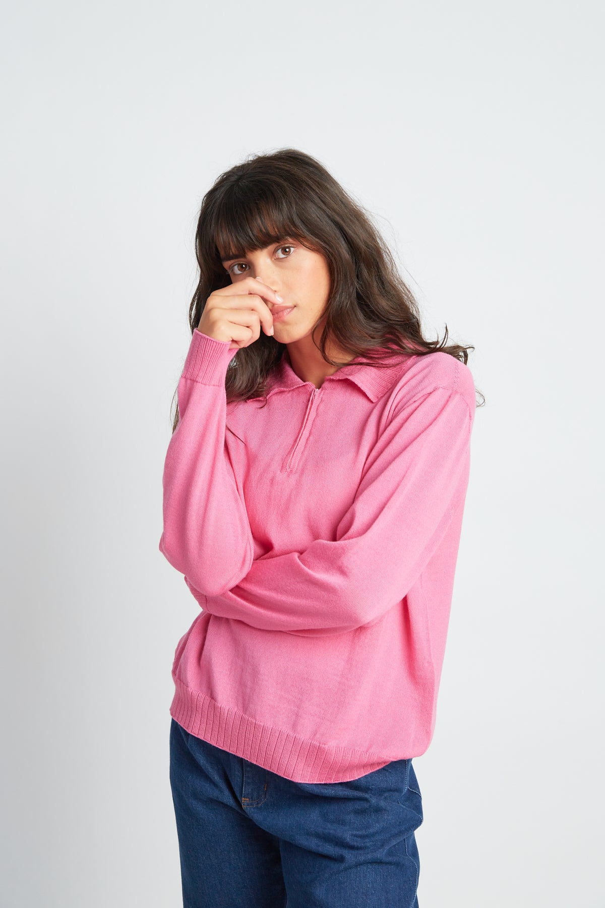 Katie jumper by twenty-seven names. A light-weight 100% merino sweater with a zip at the centre-front and a little collar. Pictured in Candy pink.