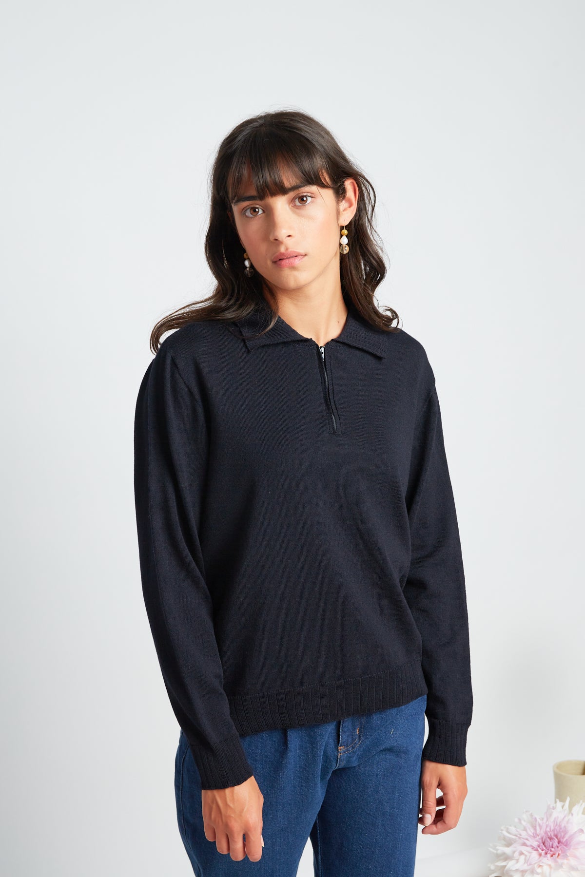 Katie jumper by twenty-seven names. A light-weight 100% merino sweater with a zip at the centre-front and a little collar. Pictured in navy.